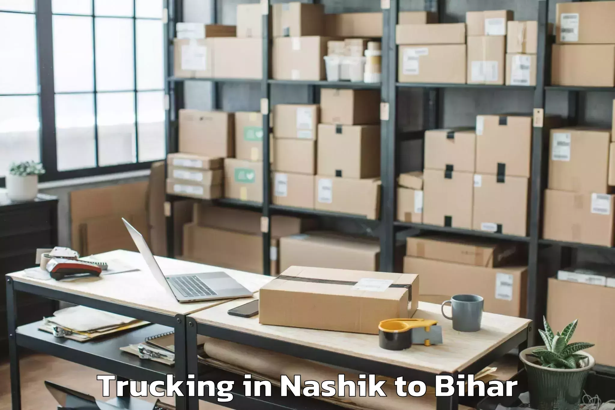 Book Nashik to Barauli Trucking